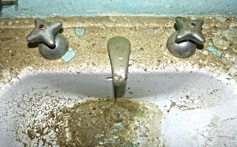 Dirty sink after a sewer back up that has not been cleaned