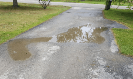 Damages to a driveway from standing water