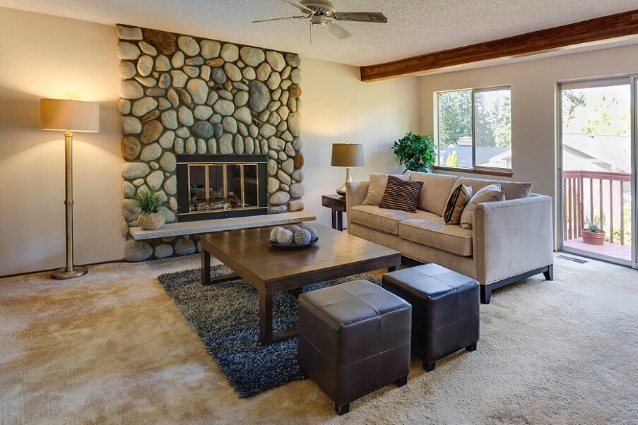 Stone fireplace in cozy room