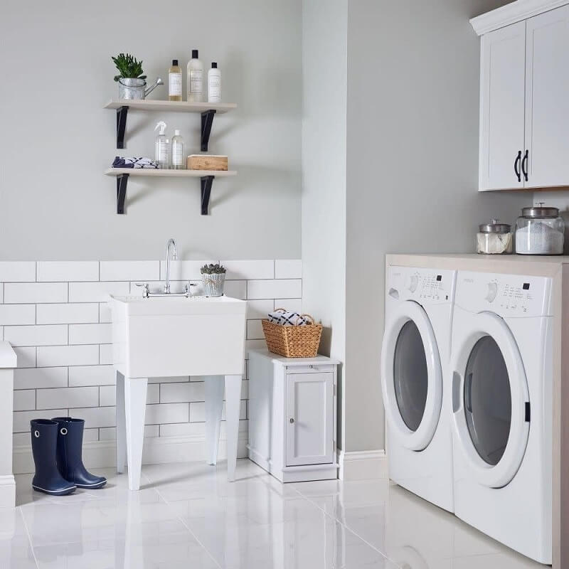 Functional laundry room with sink and storage