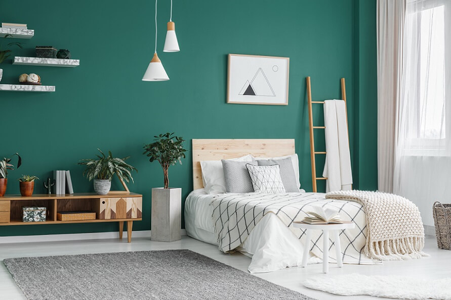 Minimalist master bedroom with green wall