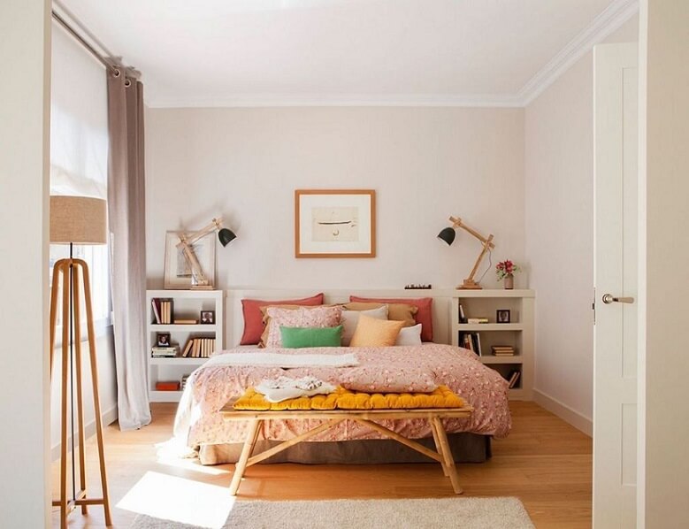 Bedroom with an art placed against the bed