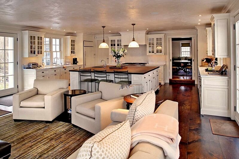 Open concept kitchen and living room with hardwood floors