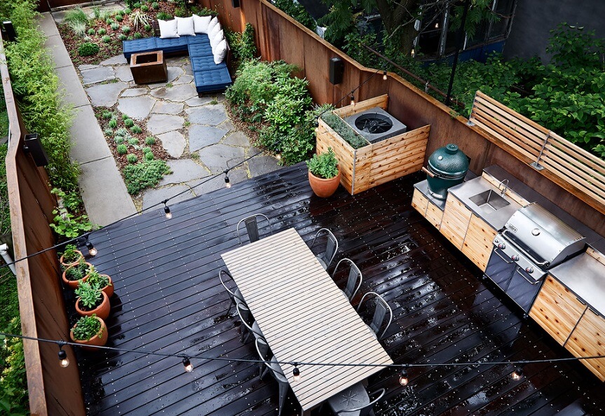 Overview of a backyard kitchen with seating area
