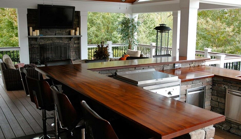 Wood countertops in a covered outdoor space