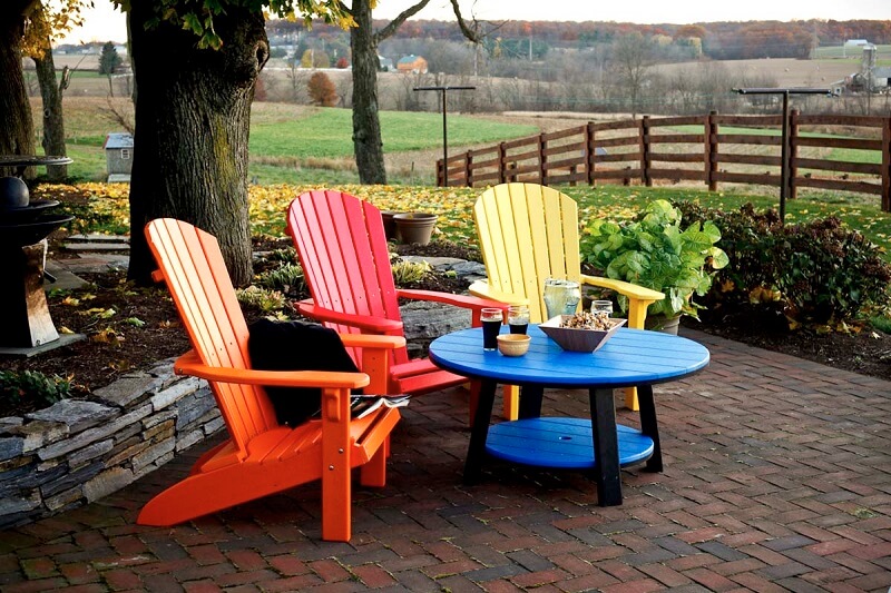 Plastic outdoor furniture on a brick patio