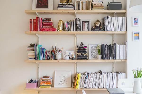 Bright and large bookshelf near a window