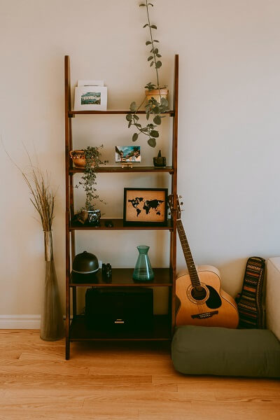 Beautiful hardwood shelf with guitar