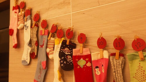 Socks advent calendar above fireplace