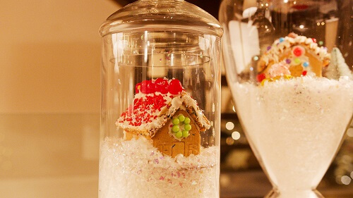 Small glass jar with gingerbread inside