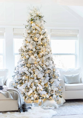 Large white Christmas tree in a living room