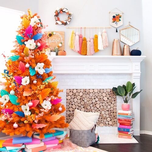 Orange Christmas tree in a white room