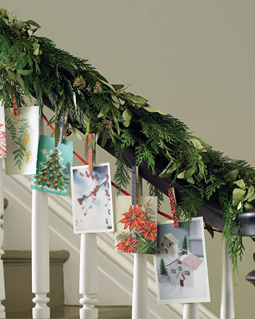 Evergreen garland on a wooden railing