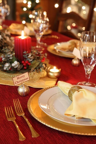 Fancy holiday table spread and settings