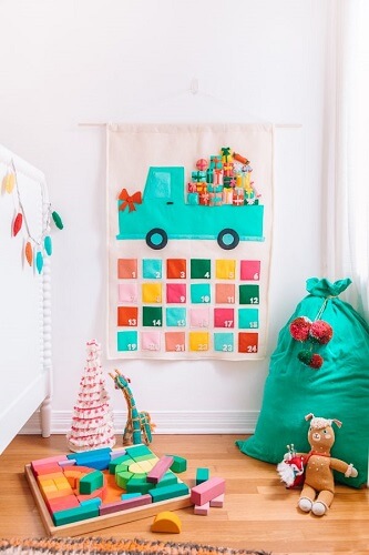 Colourful DIY Felt advent calendar in kids room