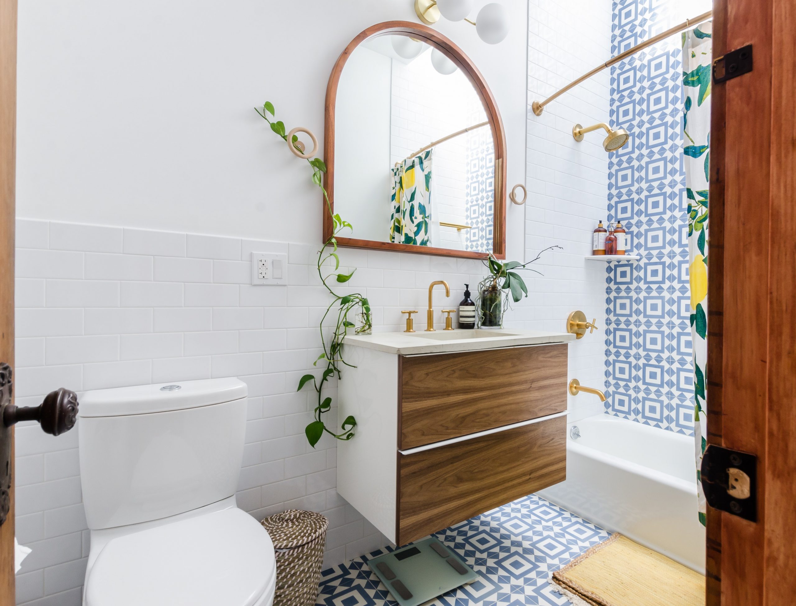 White bathroom with wood highlights