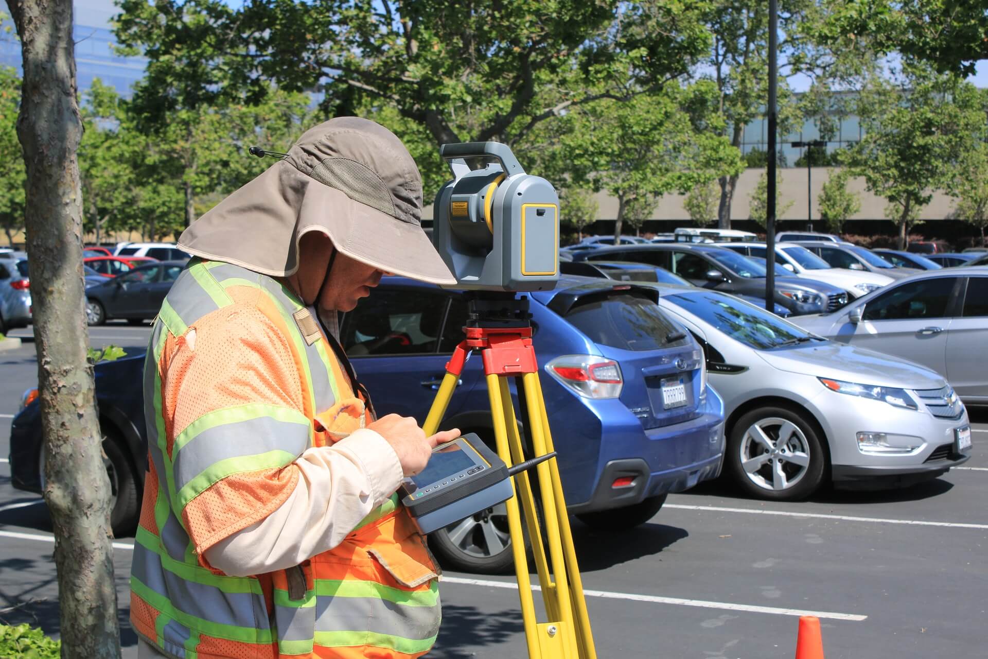 Surveyor with theodolite