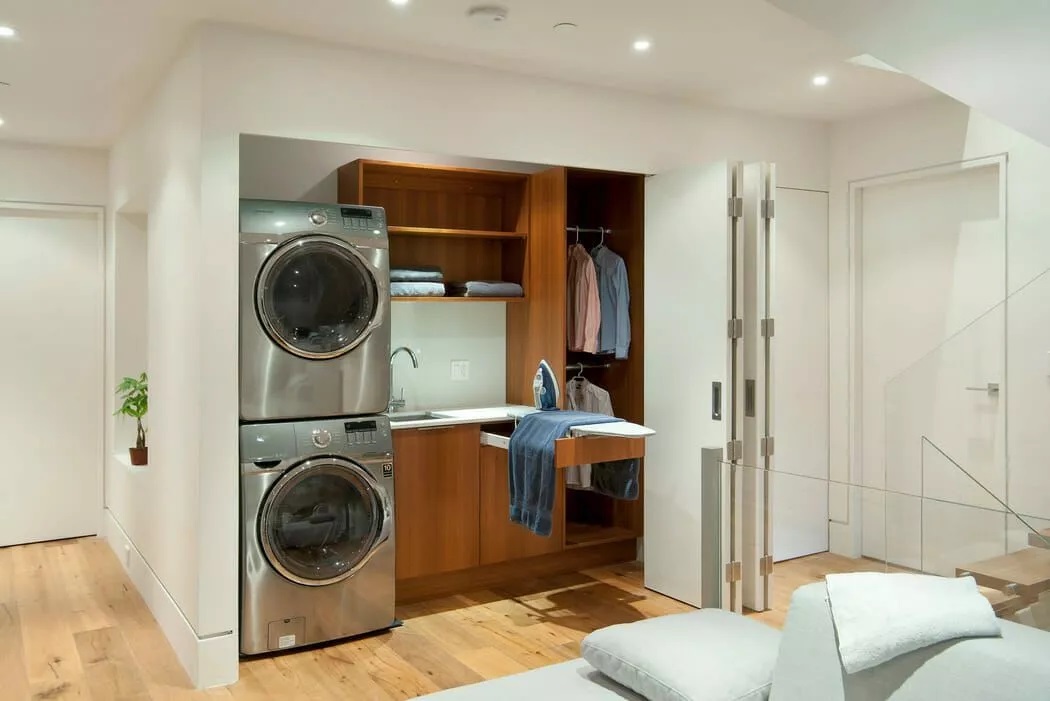 A laundry room close to the bedroom