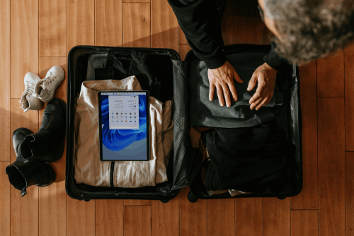 A man packing a suitcase