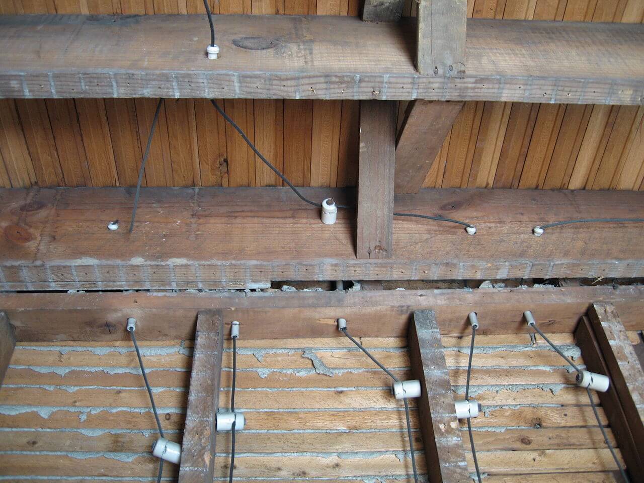 Example image showing knob and tube wiring in a basement