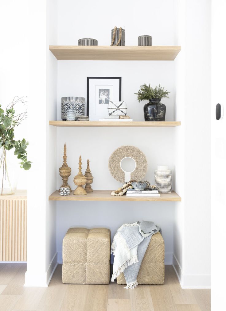 White and modern room with styled shelves